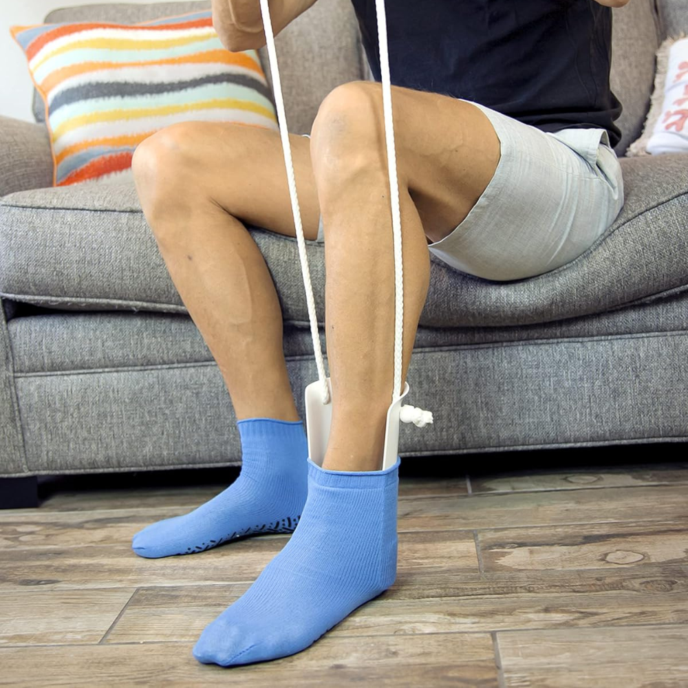 Sock Aid Tool with Curved Plastic Shell and Foam Padded Handles