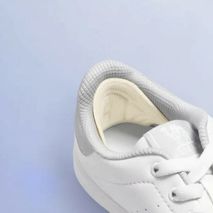 Heel Grips with Self Adhesive Backing and Adjustable Cut Design, Trimmable