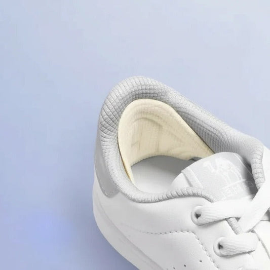 Heel Grips with Self Adhesive Backing and Adjustable Cut Design, Trimmable
