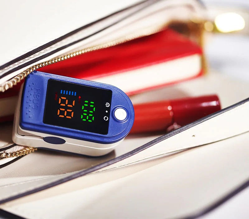 Portable Fingertip Pulse Oximeter with Color LED Display and Light Shield