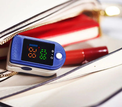 Portable Fingertip Pulse Oximeter with Color LED Display and Light Shield
